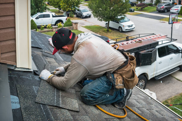 Professional Gutter Repair And Installation technician working in Elmore, OH